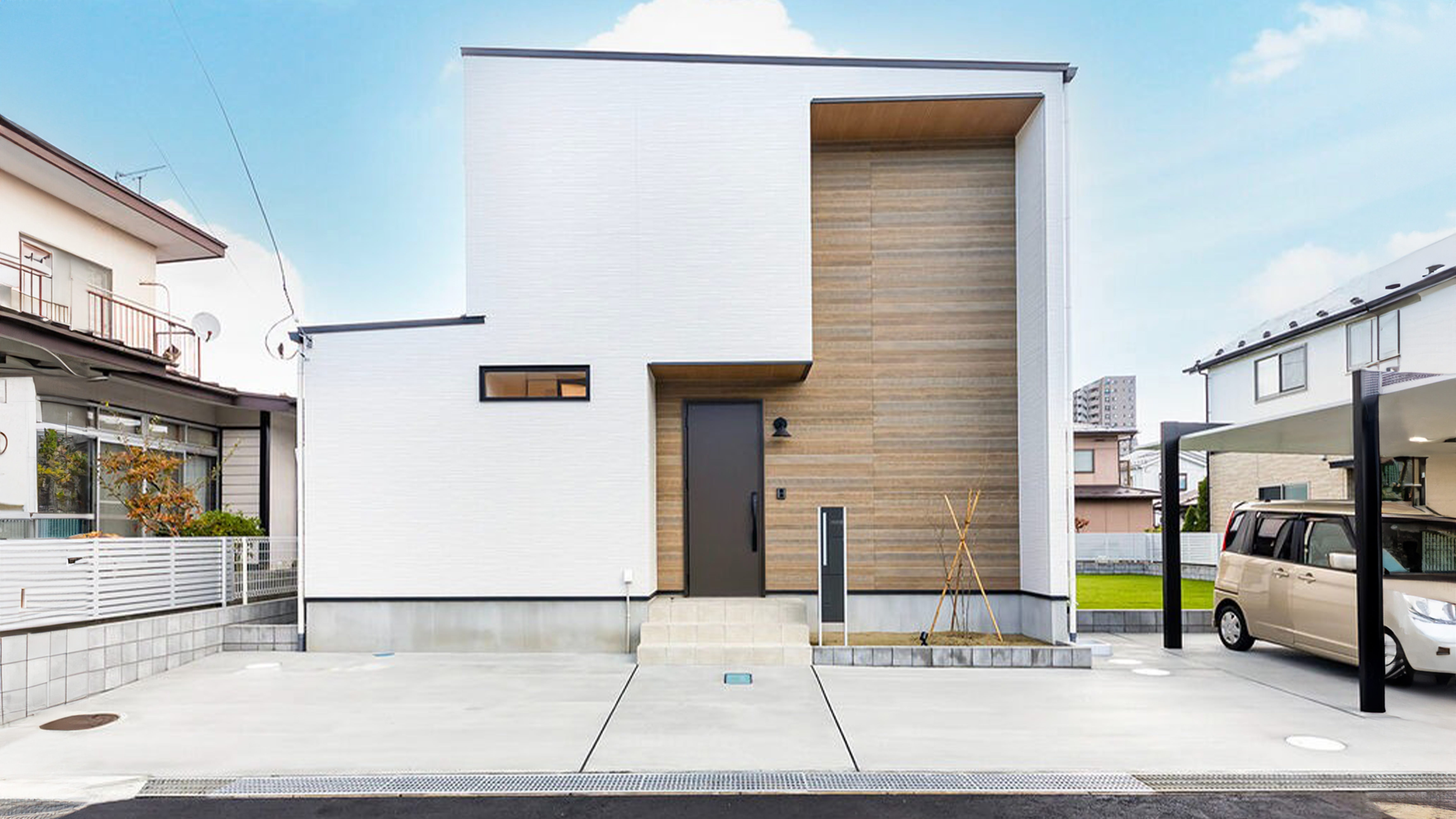 白が映える個性的なフォルム。水まわりの動線に配慮した居心地のよい家