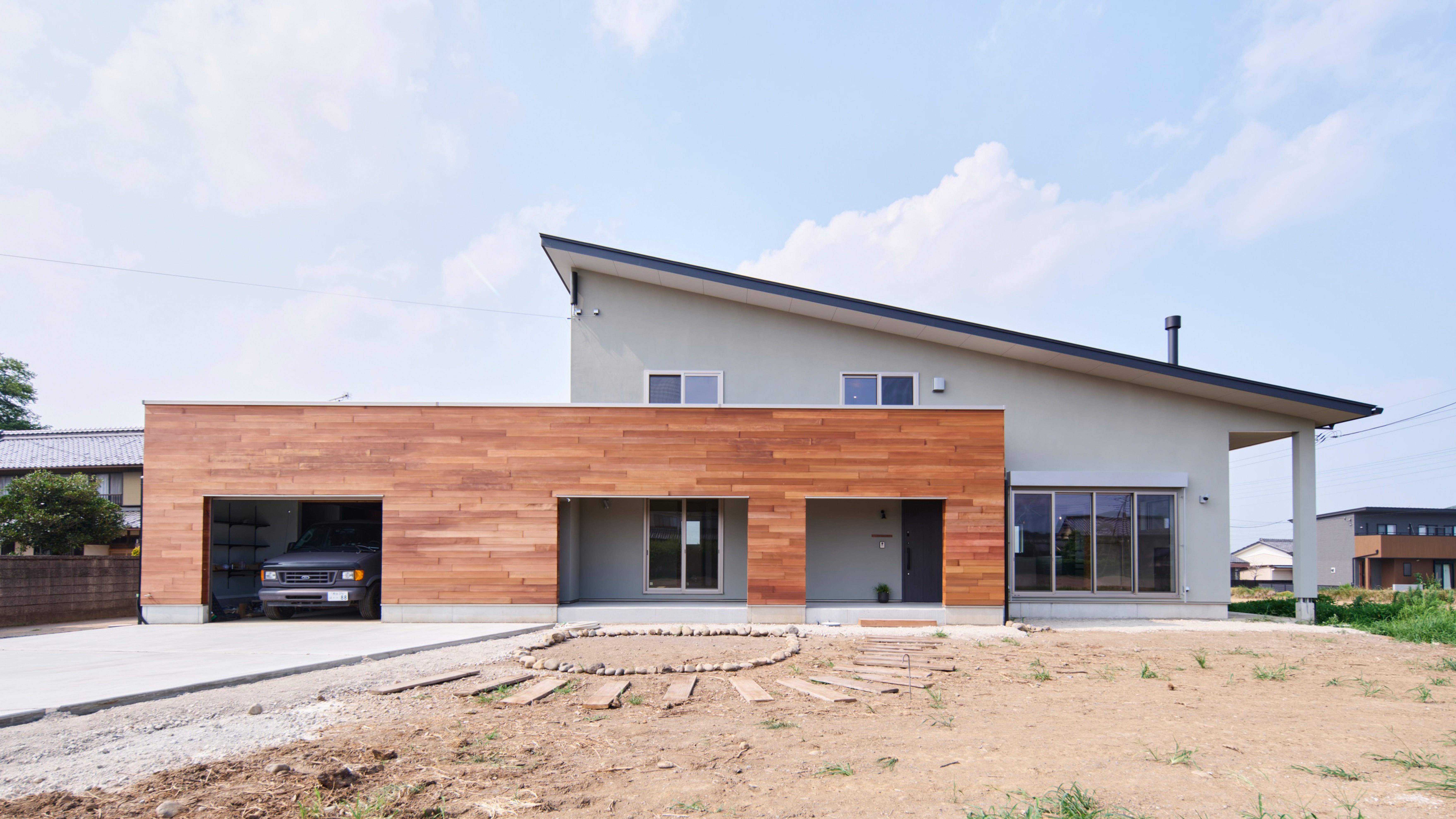 人が集い 光と景が巡る家